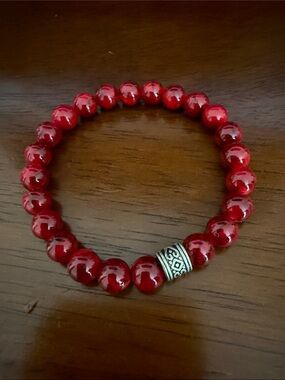 Red Beaded Stretch Bracelet with Decorative Silver Accent